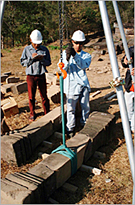 Loa trainees restoring an artifact with the provided equipment
