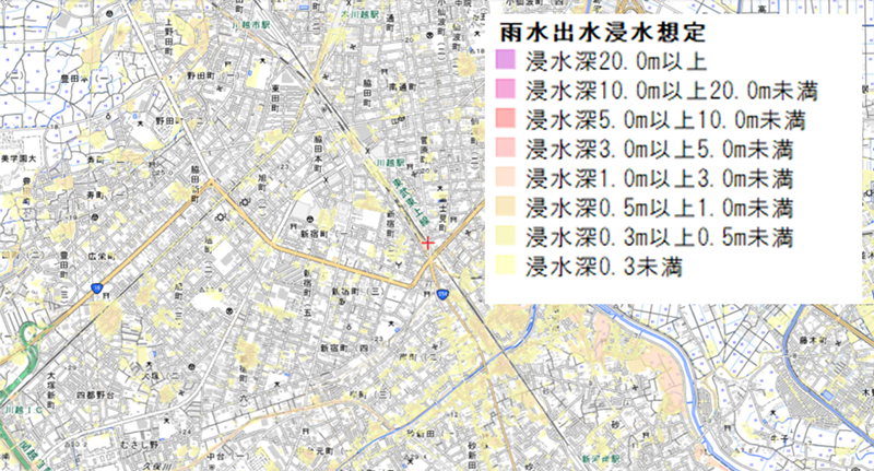 市街地の雨水出水（内水氾濫）浸水想定区域図。詳細な住宅街の地図上に、浸水の深さが色分けされています。図の右側を流れる河川沿いや、道路・線路沿いの低地に、0.3m未満の「薄黄色」から3m未満の「オレンジ」の浸水想定が点在しています。凡例は20m以上から0.3m未満まで8段階ありますが、この地域では主に住宅が床下・床上浸水する恐れのあるレベルのリスクが示されています。